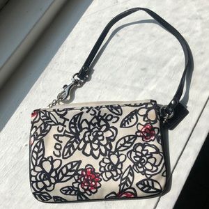 Coach black and beige with roses design wristlet